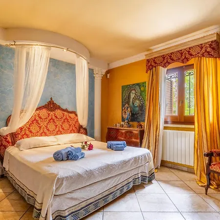 Tiziana Villa *