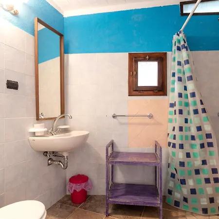 Tiziana Villa *